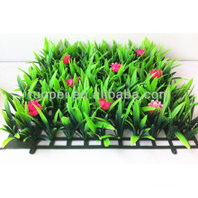 Wholesale Lifelike PE 25*25cm artificial grass lawn with flowers ornaments